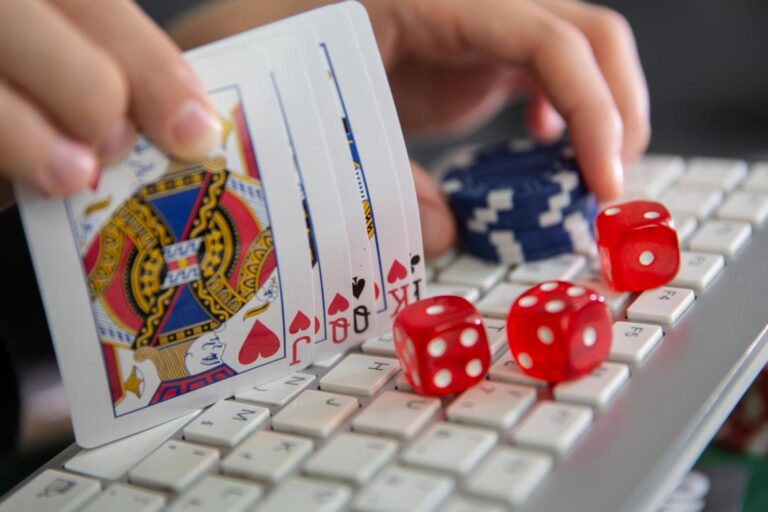 This is the image for online table games Philippines. Filipino player interacting with a live dealer during an online blackjack game